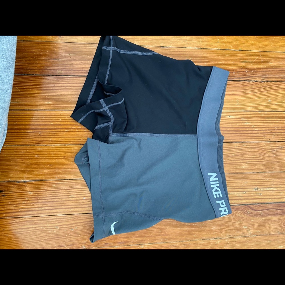 Two-toned Nike pros. Never worn.